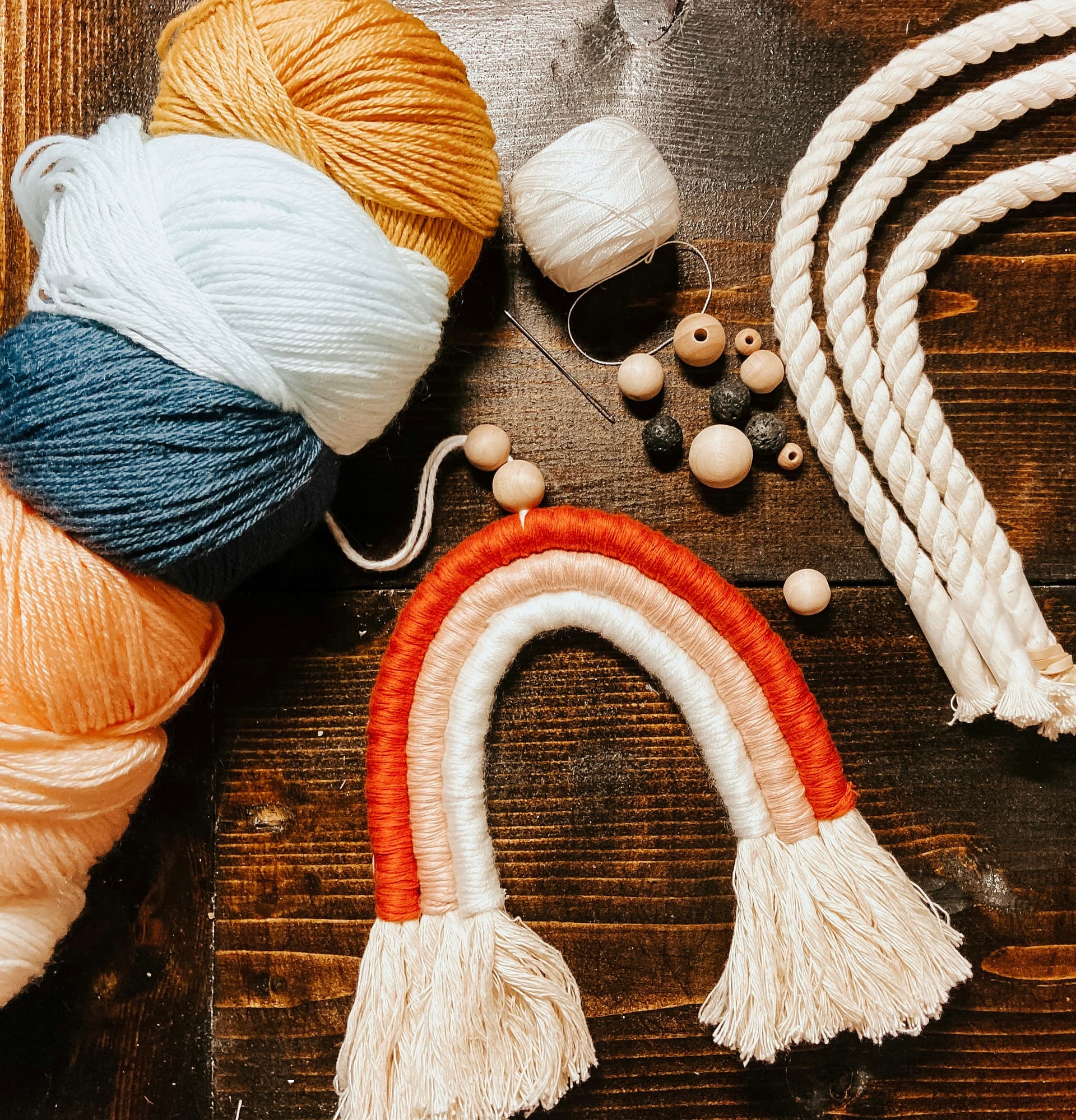 Crafting materials with yarn and wooden beads