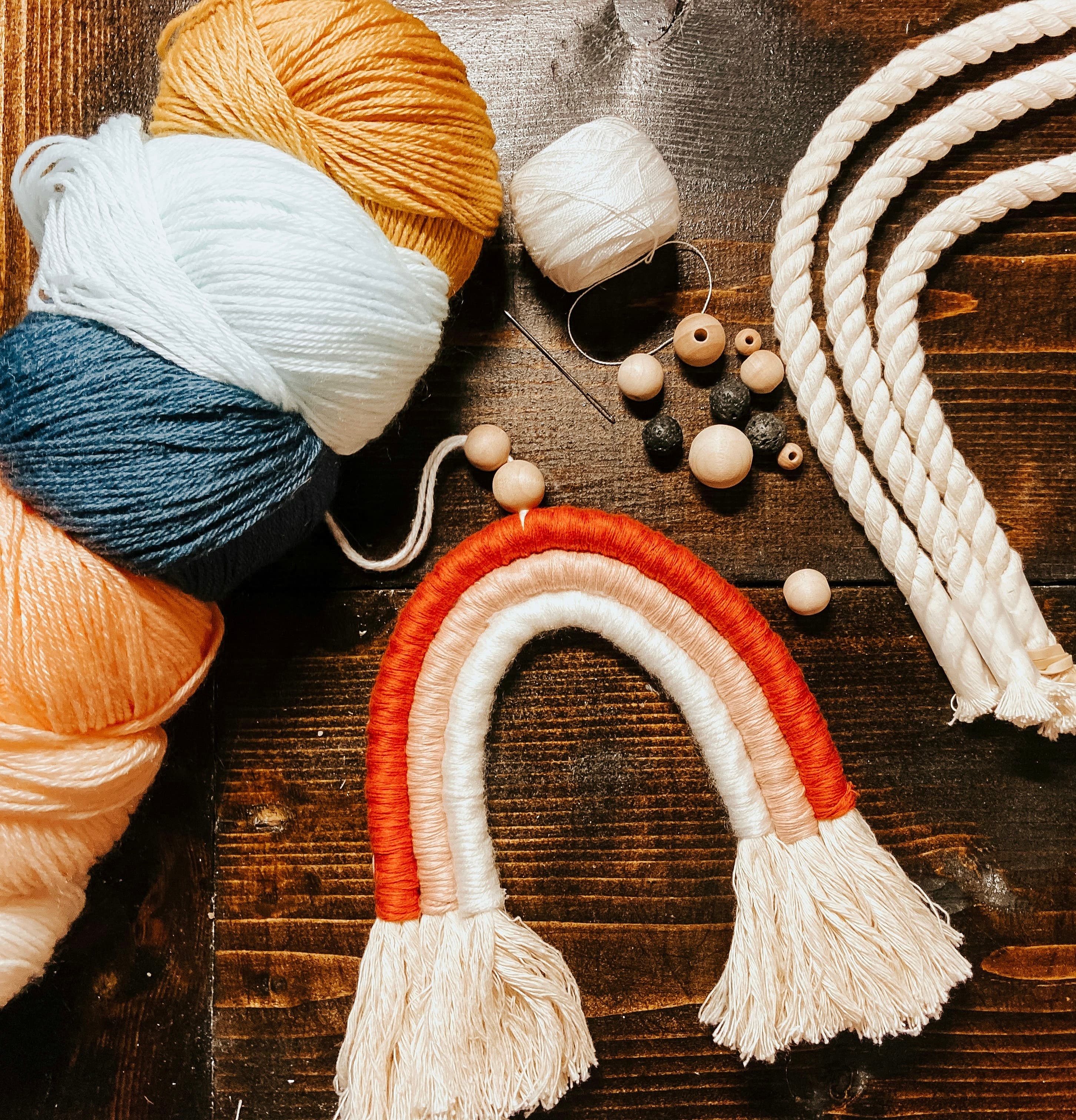 Crafting materials with yarn and wooden beads